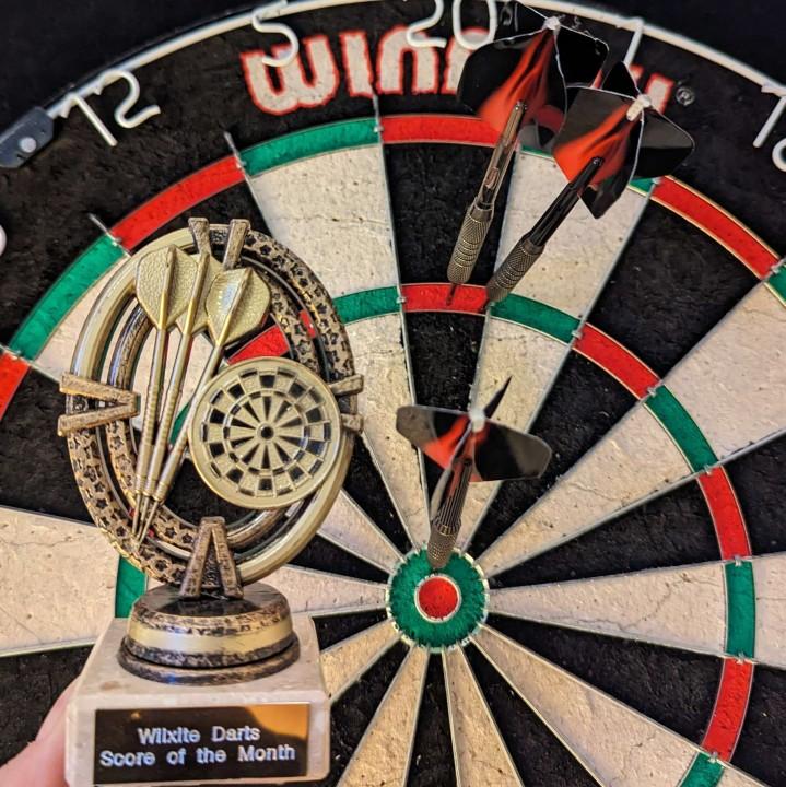 Dartboard and trophy